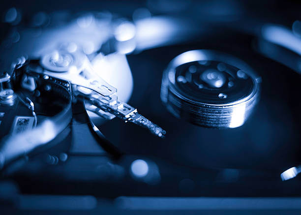 istock Exploration of a hard disk drive showcasing intricate components and technology used in data storage processes 2225107429