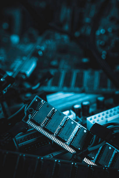 istock Close-up view of electronic circuit boards and components in a low-light environment demonstrating intricate designs and textures 2225108302