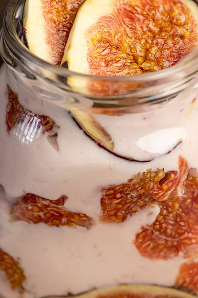 istock glass jar with fresh yogurt with ripe fresh figs 2225112907
