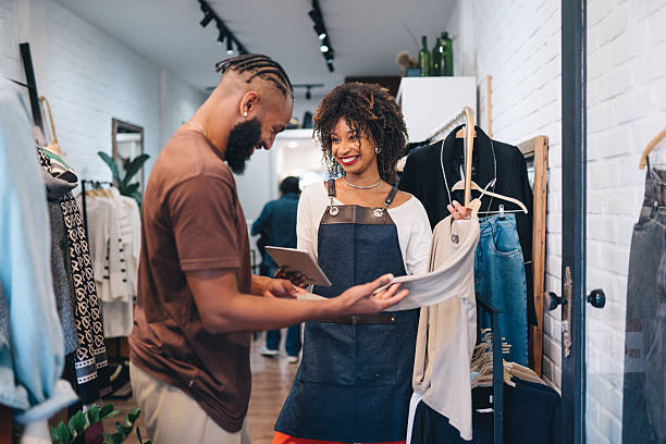 istock Woman assisting customer in a store 2225114317