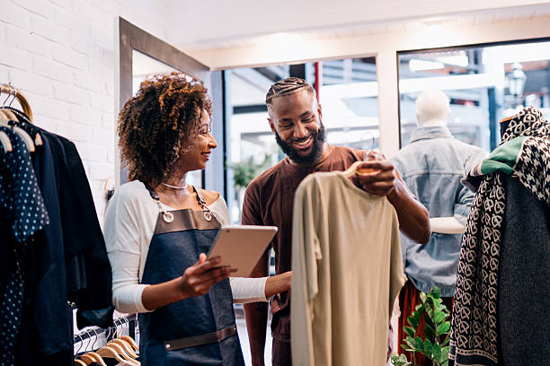istock Woman assisting customer in a store 2225114318