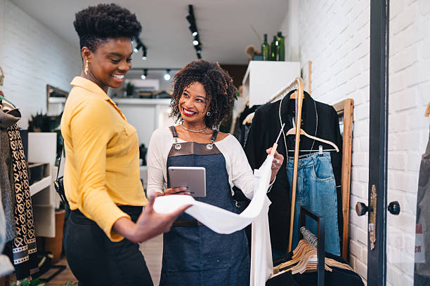 istock Woman assisting customer in a store 2225114340