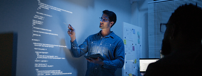 Computer Code In Latin Hispanic Latin American Man Software Engineer Developer Use Computer ...