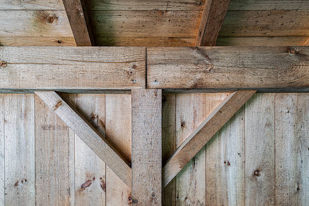istock Close-Up of Timber Frame Joinery in Rustic Barn Wall 2225114866