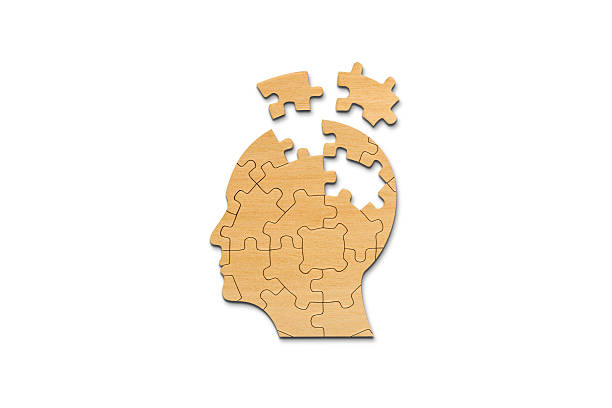 istock Head and brain diseases concept. A missing pieces of the brain puzzle on white background. 2225118112