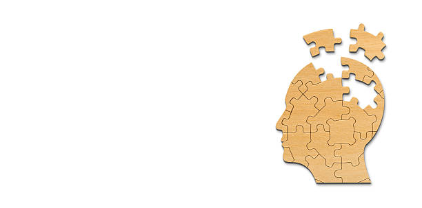 istock Head and brain diseases concept. A missing pieces of the brain puzzle on white background. 2225118117