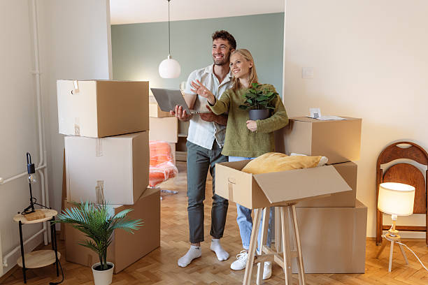 istock Smiling couple brainstorming interior design ideas for their new home 2225118630