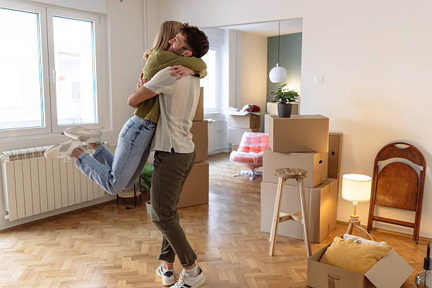 istock A happy couple celebrating a moving-in day 2225118668