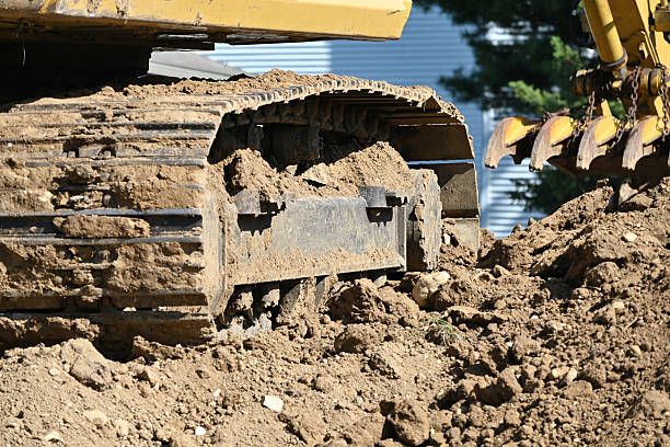 istock Excavator in the Dirt 2225118689
