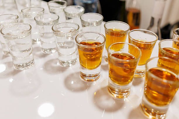 istock shot glasses lined up on a bar countertop ready for a celebration 2225119198