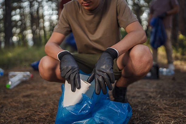 istock close up on unknown man hands hold paper and plastic bag 2225120513