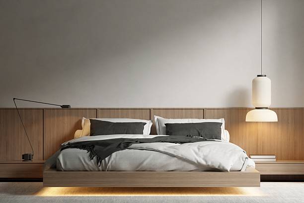 istock Modern Minimalist Bedroom with Wooden Platform Bed – Soft Ambient Lighting 3D Render 2225121591