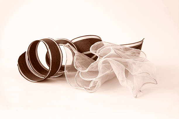 beige cloth and ribbon design / background material