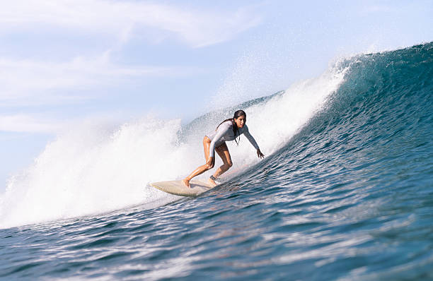 istock Surf lady surfing Oeselli 2 2225129030