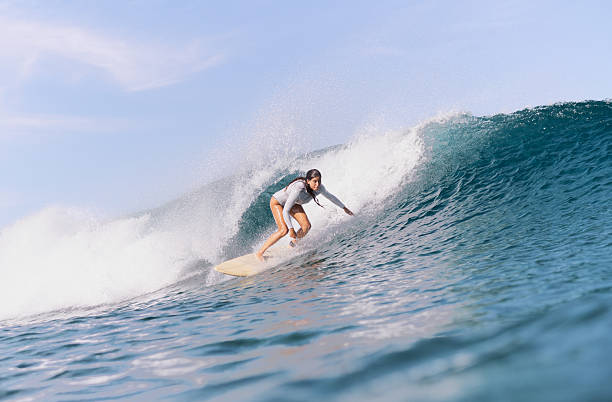 istock Surf lady surfing Oeselli 3 2225129047
