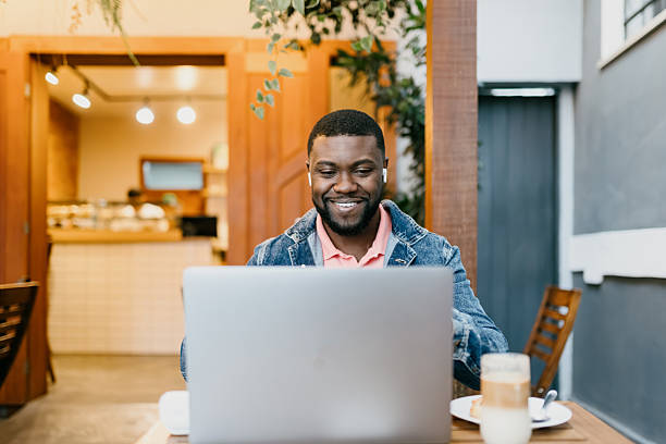 istock Young entrepreneur focused on laptop at cafe 2225132064