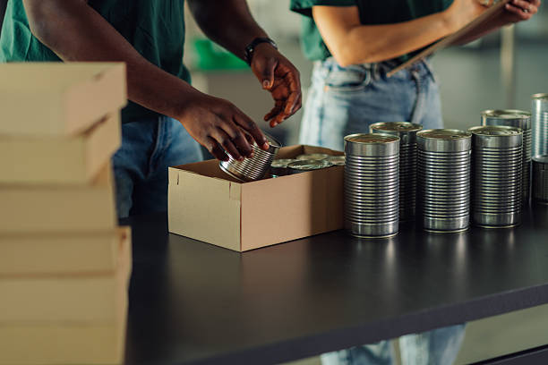 istock Volunteers preparing food donations for people in need 2225137424