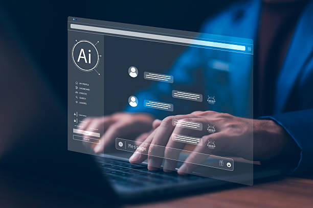 istock Businessman using a laptop with an AI Chatbot on a virtual screen for Q&A and customer service support. Concept of artificial intelligence, machine learning, and business automation technology. 2225146939