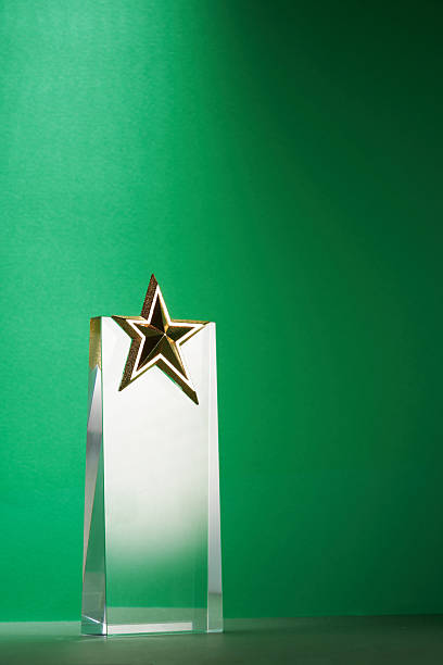 istock crystal trophy star shaped award against green background 2225147161