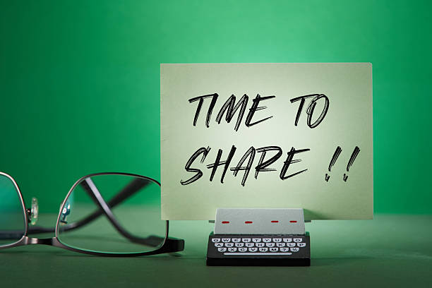istock note with text ' time to share ' on the toy typewriter and eyeglasses 2225147384