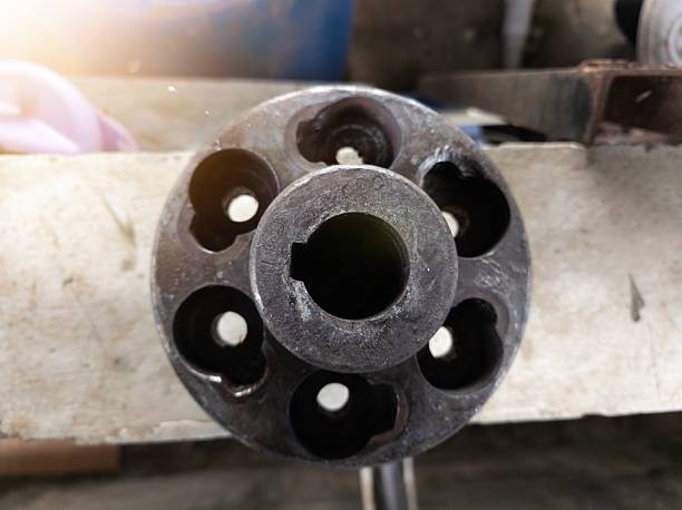 istock Close up an worn or damaged motor pump rotation connection flange. 2225148306