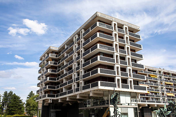 istock Brutalist style residential building with a summer sky 2225148789