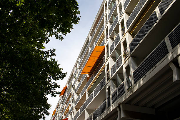 istock Orange coloured canopy outside a modern city apartment building 2225148821