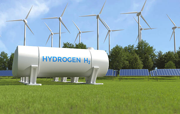 istock Hydrogen storage with solar panels and wind turbines, Net zero emissions concept. 3D illustration 2225148832