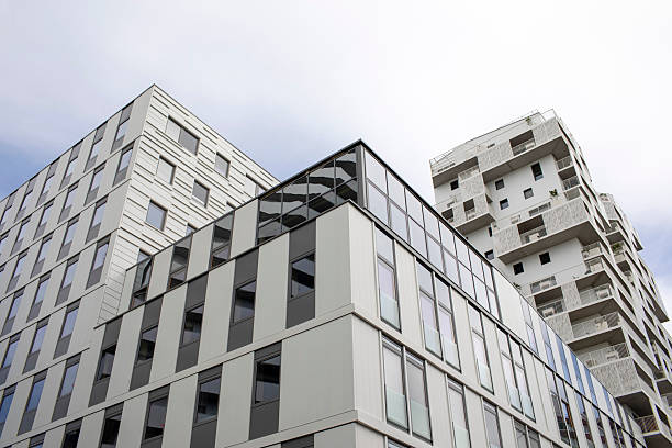 istock Futuristic high-rise apartment buildings viewed from a low angle 2225148859