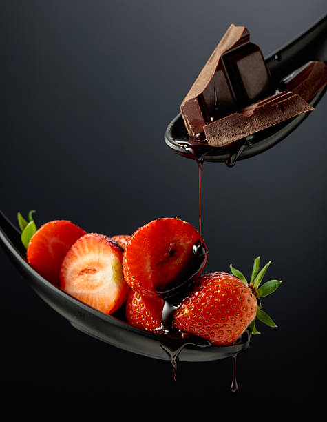 istock Fresh strawberries and melted dark chocolate. 2225150088