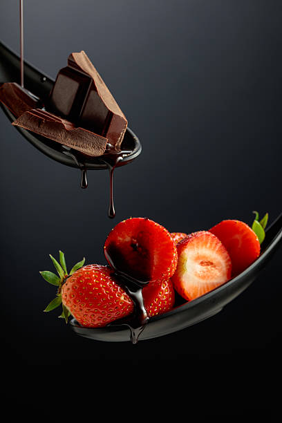 istock Fresh strawberries and melted dark chocolate. 2225150089