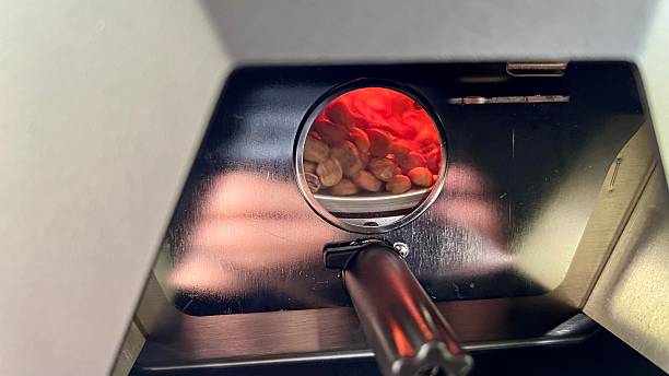 Coffee machine with coffee beans and magnifying glass