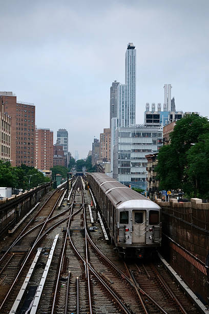 istock Subway Train Entering Tunnel in Harlem (New York, New York, USA) 2225153563