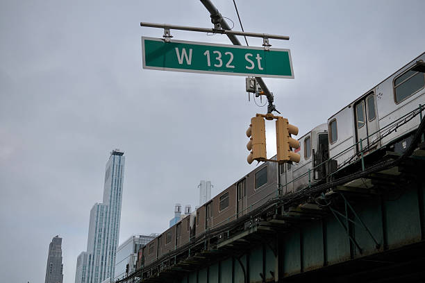 istock Subway Train and Street Sign at West 132nd (New York, New York, USA) 2225153596