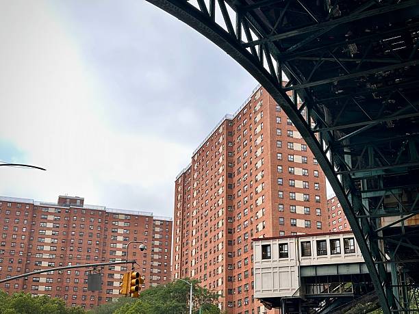 istock Housing Towers and Subway Stop Framed by Elevated Tracks (New York, New York, USA) 2225153663