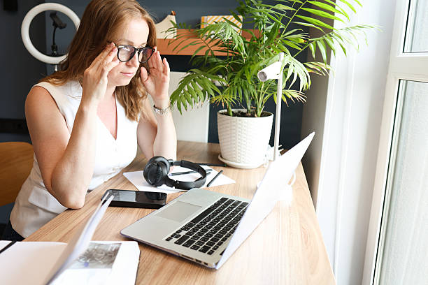 istock Woman Working Remotely at Home Office Desk 2225157827