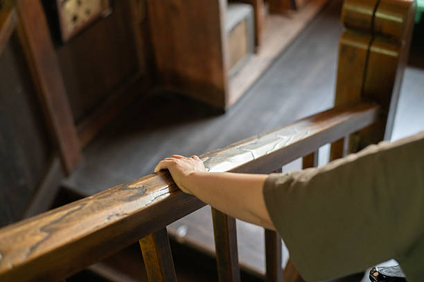 Person holding on to handrail