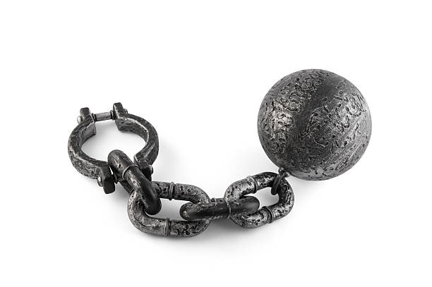 istock Old heavy iron ball with chain and shackle on white background with clipping path 2225160427
