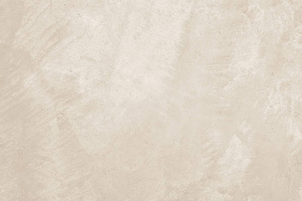 istock Colour old concrete wall texture background. Close up retro plain cream color cement wall background texture. Design paper vintage parchment element. 2225163184