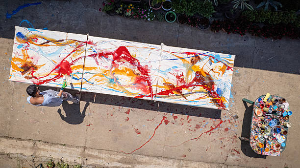 istock Artist creating on the street 2225169306
