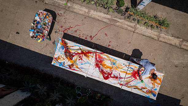 istock Young adult painter drawing in outdoor studio 2225169362
