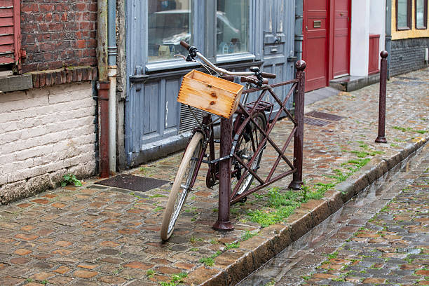Bicycle on a cobblestone street in the old town district of Lille, France