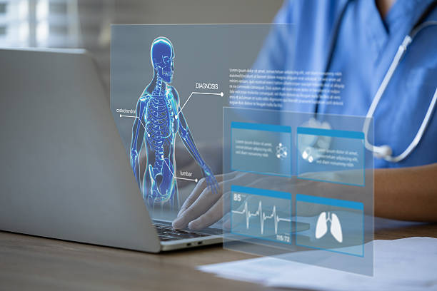 istock Doctor using a laptop with medical interface displaying a human skeleton. 2225178392