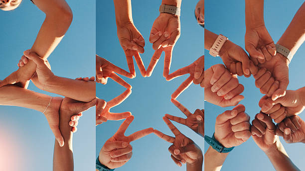 istock Blue sky, collage and below of hands with friends for support, collaboration or teamwork. Group, low angle and men and women with star, fist bump and huddle for connection, solidarity or bonding 2225179155