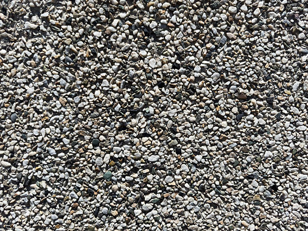 istock Small stones background, small stones, textured wall 2225179641