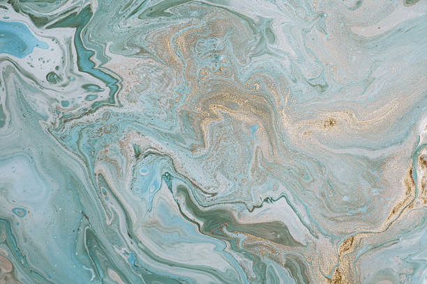 istock Abstract acrylic fluid texture in blue tones and golden splashes 2225183985