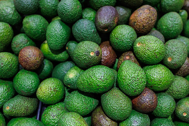 istock Fresh ripe avocados displayed at a supermarket 2225185289