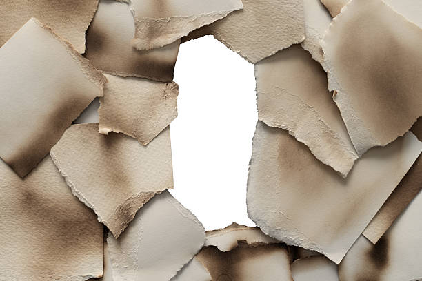 istock Brown And Beige Burnt Textured Paper Pieces 2225187121