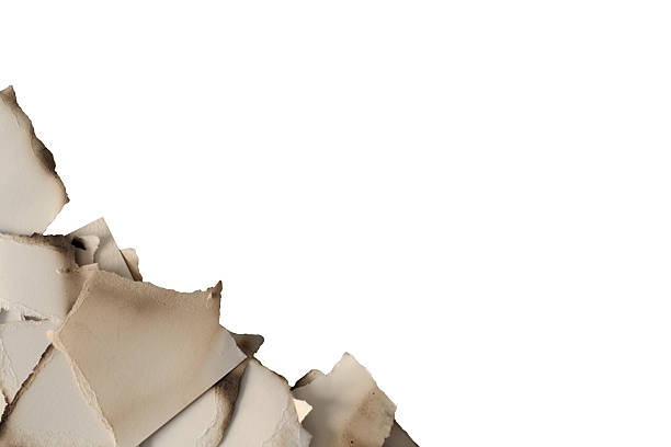 istock Brown And Beige Burnt Textured Paper Pieces 2225187138