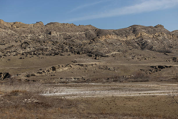 istock Majestic Mountain View Across Vast Field 2225192299